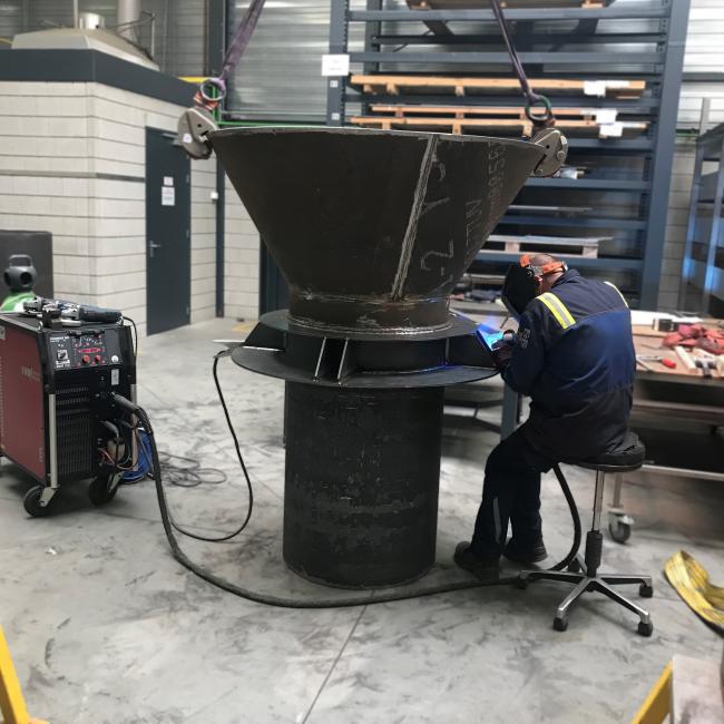 One of Montair's welders is working on a quench